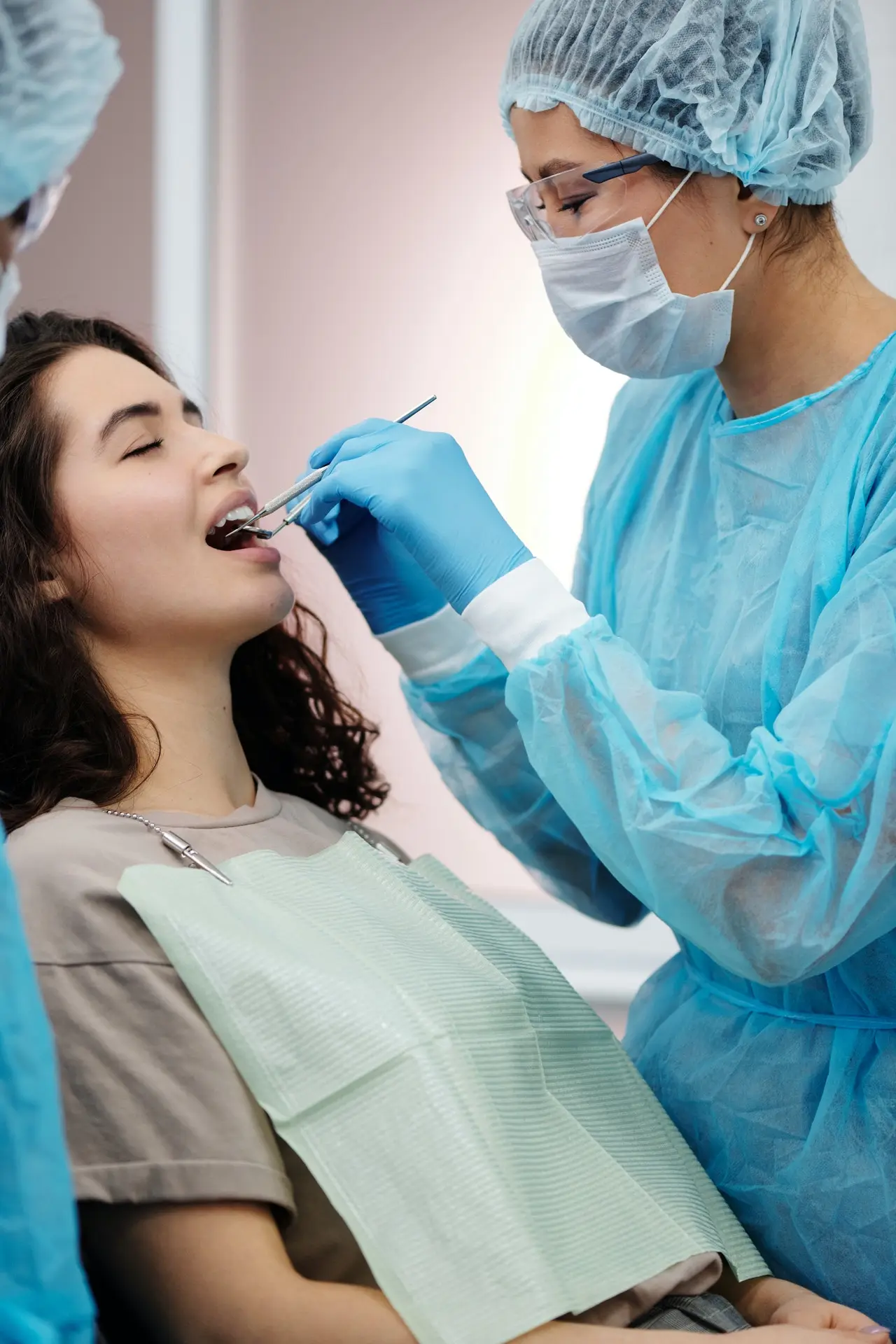 Lady with dentist for dental implants checkup 