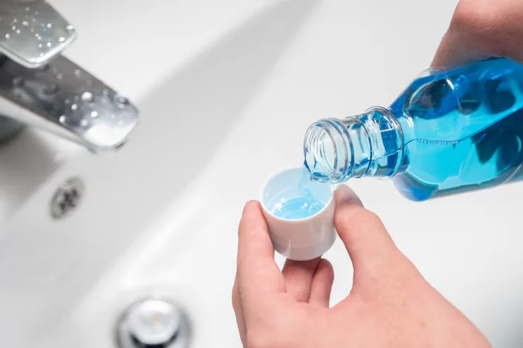 mouth rinse before or after brushing