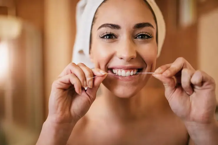how to floss properly